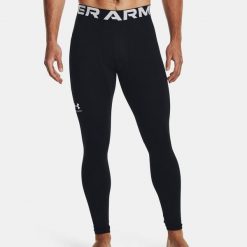 Under Armour UA CG ARMOUR LEGGINGS Legginsy męskie. Czarne bielizna termoaktywna męska Under Armour, l, bez wzorów, ze skóry, bez ramiączek, do biegania. Za 239.00 zł.