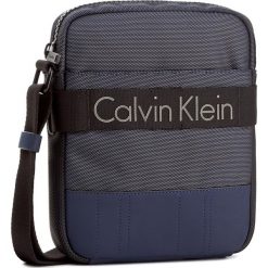 Saszetka CALVIN KLEIN - Madox Reporter K50K502853 411. Saszetki męskie marki Calvin Klein. W wyprzedaży za 329.00 zł.