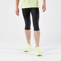 Legginsy do biegania krótkie męskie Kiprun Run 100. Czarne legginsy męskie KALENJI, l, bez wzorów, z elastanu, krótkie, do biegania. Za 54.99 zł.
