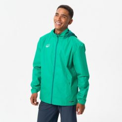 Kurtka przeciwdeszczowa Kipsta Viralto Club. Zielone kurtki męskie KIPSTA, xl, bez wzorów, z materiału, sportowe, bez ramiączek, bez kaptura. Za 99.99 zł.