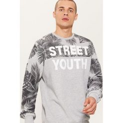 Bluza z tropikalnym printem - Szary. Szare bluzy nierozpinane męskie marki House. W wyprzedaży za 39.99 zł.