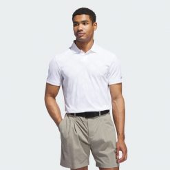 Koszulka polo Ultimate365 Tour Nylon. Białe koszulki polo męskie ADIDAS, l, bez wzorów, z nylonu, sportowe, bez kołnierzyka, bez ramiączek. Za 399.00 zł.