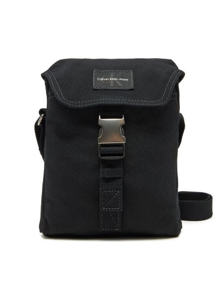 Calvin Klein Jeans Saszetka Workwear Ut Flap Reporter 18 LV04G3025G Czarny. Czarne saszetki męskie Calvin Klein Jeans, bez wzorów, z jeansu. Za 189.99 zł.