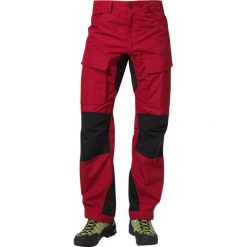 Lundhags AUTHENTIC Spodnie materiałowe red. Czerwone długie spodnie sportowe męskie marki Lundhags, z bawełny, sportowe, długie. W wyprzedaży za 559.20 zł.