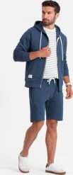Ombre Męski dresowy komplet bluza rozpinana + szorty ciemnoniebieski V4 Z76 S. Niebieskie bluzy rozpinane męskie Ombre, m, bez wzorów, z dresówki, bez ramiączek, bez kaptura. Za 179.99 zł.