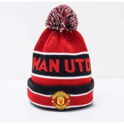 Czapka New Era Manchester United Jake Knit Cuff. Czarne czapki męskie New Era, bez wzorów, sportowe. Za 149.99 zł.