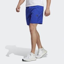 Train Essentials Woven Training Shorts. Czarne buty treningowe męskie ADIDAS, bez wzorów, z materiału, sportowe. Za 119.00 zł.