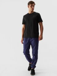 4F Spodnie casual joggery męskie - granatowe S. Niebieskie spodnie na co dzień męskie 4f, bez wzorów, z bawełny, casualowe. W wyprzedaży za 99.99 zł.