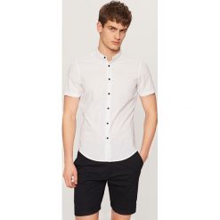 Koszula super slim fit - Niebieski. Niebieskie koszule męskie Reserved, m, bez wzorów, bez kołnierzyka, bez ramiączek. W wyprzedaży za 39.99 zł.
