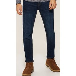 Jeansy regular fit - Granatowy. Niebieskie jeansy męskie House, z jeansu. Za 129.99 zł.