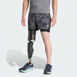 Szorty Own The Run Spray Dye 2-In-1. Czarne szorty sportowe męskie ADIDAS, bez wzorów, sportowe. W wyprzedaży za 155.35 zł.