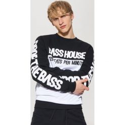 Bluza z napisami - Czarny. Bluzy nierozpinane męskie marki House. W wyprzedaży za 79.99 zł.