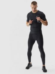 4F Legginsy treningowe ze średnim stanem męskie - czarne M. Czarne legginsy męskie 4f, l, bez wzorów, z dzianiny, na fitness i siłownię. W wyprzedaży za 69.99 zł.