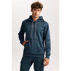 Męska bluza dresowa Rough Radical Dynami Pro Hoodie Men. Niebieskie bluzy nierozpinane męskie ROUGH RADICAL, m, bez wzorów, z dresówki, sportowe, bez ramiączek, bez kaptura. Za 169.90 zł.