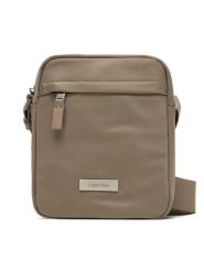 Calvin Klein Saszetka Sleek Reporter LV04D3180G Beżowy. Brązowe saszetki męskie Calvin Klein, bez wzorów, z materiału. Za 299.99 zł.
