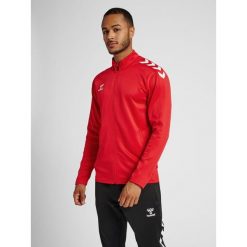 Bluza sportowa dla dorosłych Hummel Core XK Poly Zip Sweat. Czerwone bluzy nierozpinane męskie HUMMEL, s, bez wzorów, sportowe, bez ramiączek, bez kaptura. Za 212.50 zł.