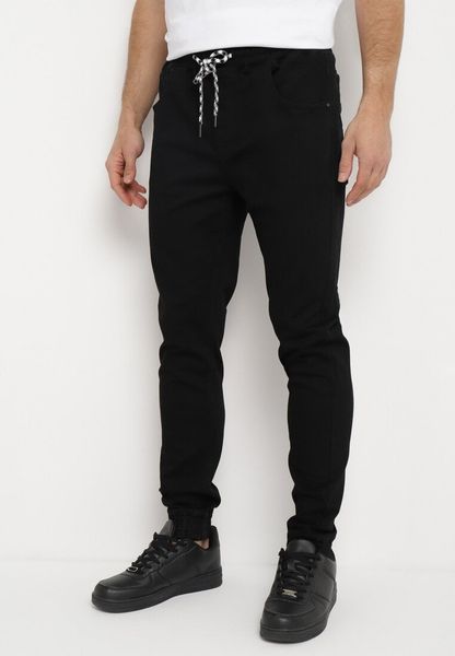 Czarne Jeansy Joggery ze Ściągaczami i Sznurkiem w Pasie Winara. Czarne jeansy męskie Born2be, bez wzorów, z jeansu. Za 64.99 zł.