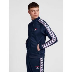 Bluza dresowa zapinana na zamek błyskawiczny Hummel IC Lerby Poly. Niebieskie bluzy bez kaptura męskie HUMMEL, m, bez wzorów, z dresówki, bez kaptura. Za 284.00 zł.
