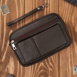 Saszetka męska skórzana do ręki z miejscem na telefon brązowa Paolo Peruzzi T-132-BR. Brązowe saszetki męskie bez wzorów, z materiału. Za 119.00 zł.