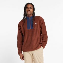 Bluza męska New Balance MT43518ROK – brązowa. Brązowe bluzy z polaru męskie New Balance, m, bez wzorów, z materiału, klasyczne, bez ramiączek, bez kaptura. Za 149.99 zł.