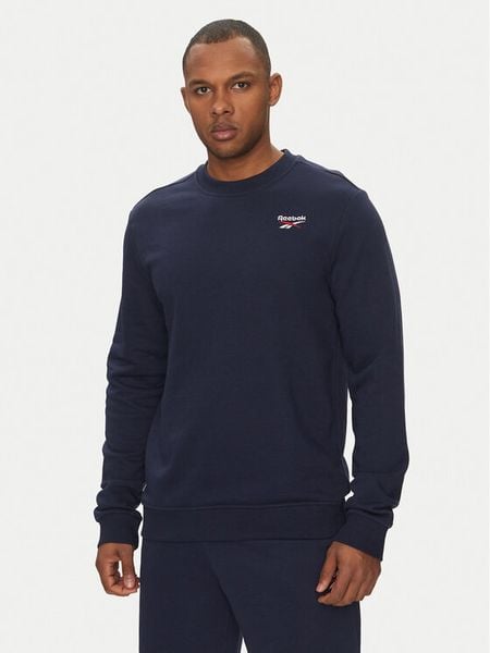 Reebok Bluza 100217146 Granatowy Regular Fit. Niebieskie bluzy nierozpinane męskie Reebok, m, bez wzorów, z bawełny, bez ramiączek, bez kaptura. Za 159.99 zł.