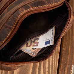 Paolo Peruzzi Saszetka męska skórzana do ręki vintage brązowa T-129-HBR. Brązowe saszetki męskie Paolo Peruzzi, bez wzorów. Za 178.58 zł.