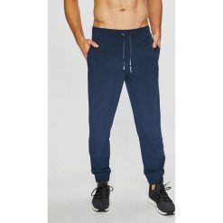 Calvin Klein Performance - Spodnie. Długie spodnie sportowe męskie marki Guess Jeans. Za 269.90 zł.