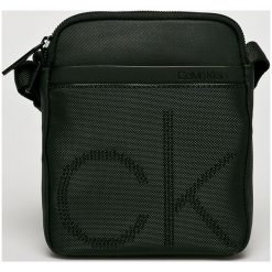 Calvin Klein - Saszetka Mini Reporter. Saszetki męskie marki Calvin Klein. W wyprzedaży za 229.90 zł.