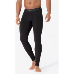 Legginsy termoaktywne męskie SUPER.NATURAL. Czarne bielizna termoaktywna męska super.natural, l, bez wzorów, bez ramiączek. Za 419.99 zł.