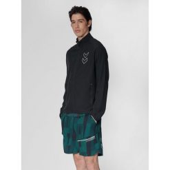 Kurtka z dresu Hummel Court. Czarne kurtki męskie HUMMEL, bez wzorów, z dresówki, sportowe, bez ramiączek, bez kaptura. W wyprzedaży za 193.50 zł.