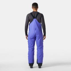 Kombinezon narciarski cargo Helly Hansen Sogn. Fioletowe spodnie narciarskie i snowboardowe męskie Helly Hansen, bez wzorów, narciarskie. W wyprzedaży za 958.00 zł.