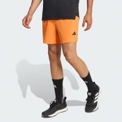 Szorty D4T Essentials. Brązowe szorty sportowe męskie ADIDAS, bez wzorów, sportowe. Za 179.00 zł.