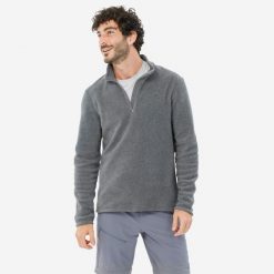 Polar turystyczny męski MH100. Szare bluzy z polaru męskie QUECHUA, m, bez wzorów, z materiału, sportowe, bez ramiączek, bez kaptura. Za 49.99 zł.