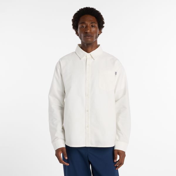 Koszula męska New Balance MT53523RFN – biała. Białe koszule męskie New Balance, m, bez wzorów, z bawełny, bez kołnierzyka, bez ramiączek. Za 389.99 zł.