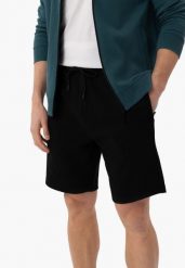 Szorty dresowe ze strukturą M-JANI. Czarne szorty sportowe męskie Volcano, bez wzorów, z bawełny, klasyczne. Za 89.99 zł.