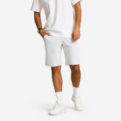 Spodenki fitness męskie Domyos regular. Szare szorty sportowe męskie DOMYOS, bez wzorów, z materiału, biznesowe. Za 79.99 zł.