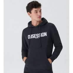 Bluza z kapturem - Czarny. Bluzy nierozpinane męskie marki House. W wyprzedaży za 49.99 zł.