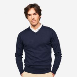 Sweter do golfa męski MW 100 dekolt w serek. Niebieskie swetry męskie INESIS, bez wzorów, z bawełny, eleganckie, bez kołnierzyka, bez ramiączek. Za 69.99 zł.