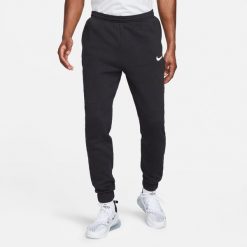 Spodnie treningowe męskie Nike FLC PARK20. Białe długie spodnie sportowe męskie Nike, bez wzorów, z bawełny, na fitness i siłownię. Za 239.99 zł.
