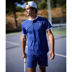 Koszulka polo męska Pro Flex. Niebieskie koszulki polo męskie NORDICDOTS, l, bez wzorów, sportowe, bez kołnierzyka, bez ramiączek. W wyprzedaży za 252.00 zł.