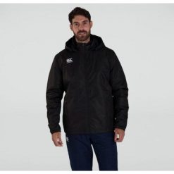 Kurtka wodoodporna Canterbury Club Vaposhield Stadium. Czarne kurtki męskie CANTERBURY, m, bez wzorów, z softshellu, bez ramiączek, bez kaptura. Za 674.50 zł.