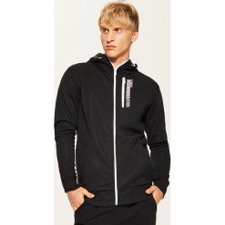 Bluza z napisami - Czarny. Bluzy nierozpinane męskie marki House. W wyprzedaży za 69.99 zł.