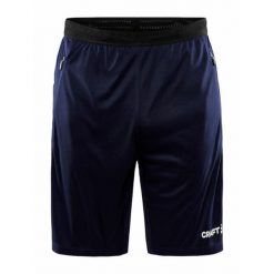 Spodenki treningowe męskie Craft Evolve Zip Pocket. Niebieskie spodnie na co dzień męskie Craft, bez wzorów, z dresówki, casualowe, krótkie. Za 167.00 zł.