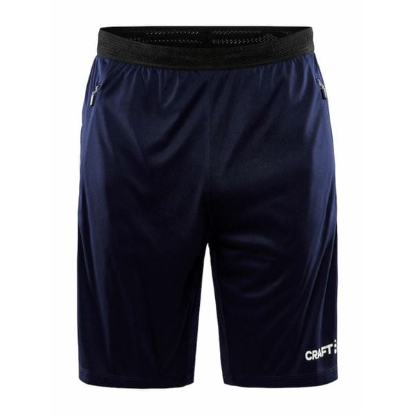 Spodenki treningowe męskie Craft Evolve Zip Pocket. Niebieskie spodnie na co dzień męskie Craft, bez wzorów, z dresówki, casualowe, krótkie. Za 167.00 zł.