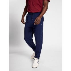 Spodnie do biegania Hummel Ic Terry. Niebieskie buty do biegania męskie HUMMEL, bez wzorów, z dresówki. W wyprzedaży za 193.50 zł.
