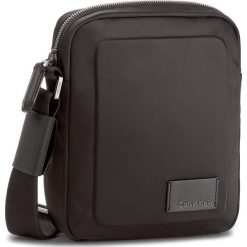Saszetka CALVIN KLEIN - Ilay Nylon Reporter K50K502831 001. Saszetki męskie marki Calvin Klein. W wyprzedaży za 309.00 zł.