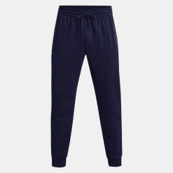 Spodnie dresowe męskie UNDER ARMOUR Rival Fleece joggery. Niebieskie spodnie dresowe męskie Under Armour, bez wzorów, z dresówki. Za 179.99 zł.