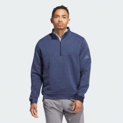 Zakładana przez głowę bluza Ultimate365 Dwr Textured Quarter Zip. Niebieskie bluzy nierozpinane męskie ADIDAS, bez wzorów, sportowe, bez ramiączek, bez kaptura. Za 329.00 zł.