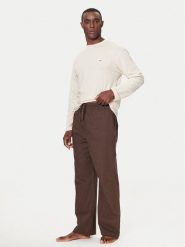 Tommy Hilfiger Spodnie materiałowe UM0UM03689 Brązowy Relaxed Fit. Brązowe spodnie na co dzień męskie Tommy Hilfiger, bez wzorów, z bawełny. Za 379.99 zł.