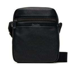 Saszetka Calvin Klein. Czarne saszetki męskie Calvin Klein, bez wzorów, młodzieżowe, małe. Za 229.99 zł.